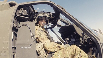 veteran in helicopter in gear
