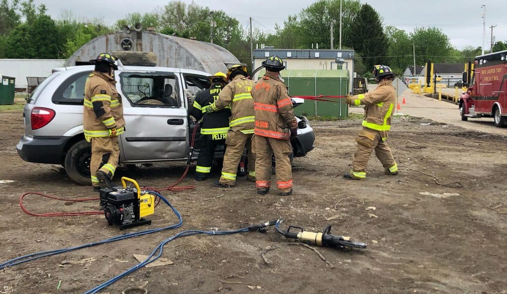 fire fighters training with car